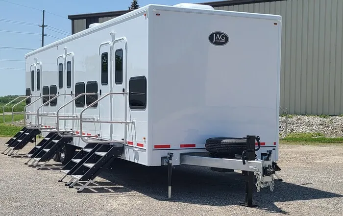 Denver bunkhouse sleeper trailer rentals. The Lavatory Denver luxury fleet