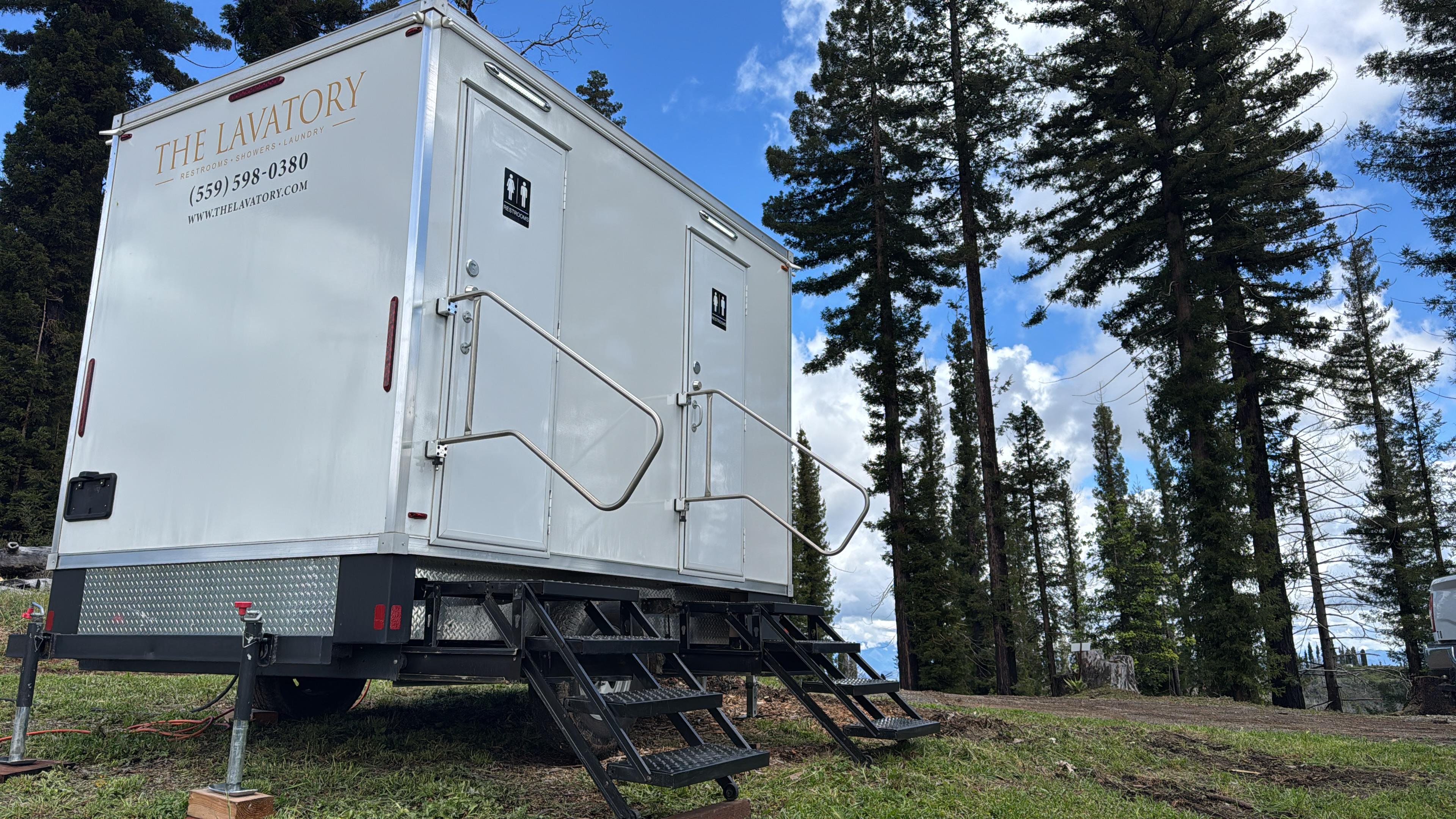 The Lavatory Denver operating standard. Luxury restroom trailer ready for deployment from a Colorado yard